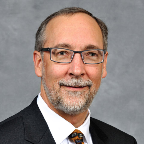 George_J._Huntley seen in white color shirt and black color suit